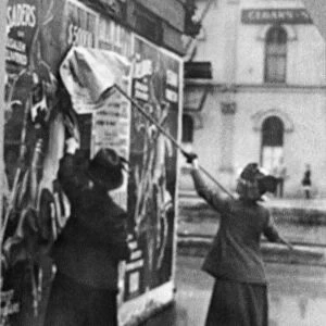 CINCINNATI: SUFFRAGETTES. Suffragettes Louise Hall and Susan Fitzgerald pasting