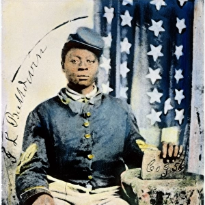 CIVIL WAR: BLACK SOLDIER. Studio portrait of Sgt. J. L. Baldwin of Company G, 56th U. S. Colored Infantry, organized in August 1863. Oil over a photograph