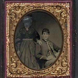CIVIL WAR: COUPLE, c1863. Portrait of a Union Army soldier and a woman whose face