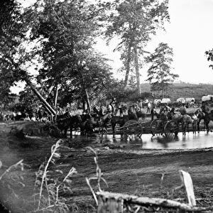 CIVIL WAR: CROSSING, 1862. Federal Battery crossing a shallow area of the Rappahannock