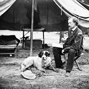 CIVIL WAR: CUSTER, 1862. Lieutenant George A. Custer with a dog at camp in Virginia, 1862