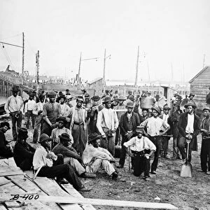CIVIL WAR: DOCK WORKERS. Black dock workers in Virginia photographed during the American Civil War
