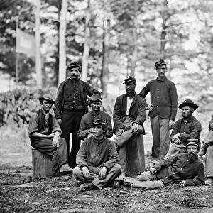 CIVIL WAR: ENGINEERS. Group of soldiers of the U. S. Engineer Battalion, at Petersburg, Virginia. Photograph, August 1864