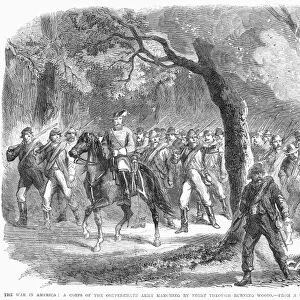CIVIL WAR: MARCHING, 1864. A corps of the Confederate Army marching by night through burning woods. Wood engraving, English, 1864