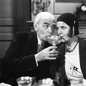 Claude Gillingwater and Winnie Lightner in a scene from the film