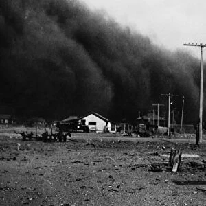 COLORADO: DUST STORM, 1935. A dust storm in Springfield, Colorado. Photograph by Dorothea Lange