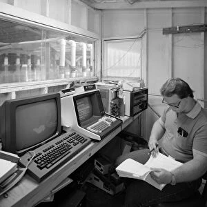 COMPUTER ROOM, 1986. An electronics engineer at the data collection computer room