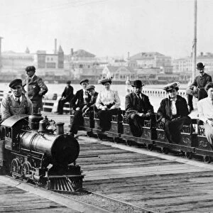 CONEY ISLAND, c1903. People on two miniature trains at Coney Island, Brooklyn, New York. Photograph, c1903