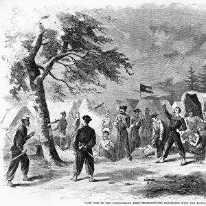 CONFEDERATE CAMP, 1861. Confederate troops from Mississippi practicing with the Bowie knife in camp. Wood engraving from a Northern American newspaper of 1861