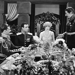 Constance Talmadge, Tullio Carminsty (at right) and Lawrence Grant (at her left) in a scene from the film
