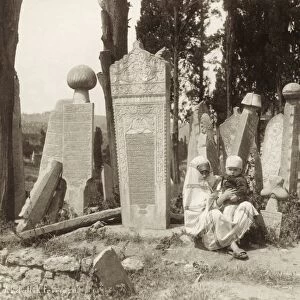 CONSTANTINOPLE: CEMETERY. A woman and child in a cemetery in Uskudar, Constantinople