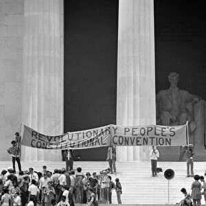 Crowds gathered on the steps of the Lincoln Memorial in Washington, D. C. during a Black Panther convention, with some party members holding a banner calling for a Revolutionary Peoples Constitutional Convention, 19 June 1970. Photographed by Warren K. Leffler or Thomas J. O Halloran