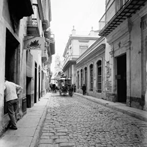 CUBA: HAVANA, c1900. Street scene probably taken from O Reilly Street showing San
