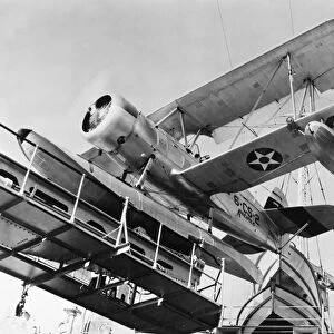 The Curtiss SOC Seagull photo reconnaissance seaplane ready to be launched by catapult from a ship. Mid-20th century photograph
