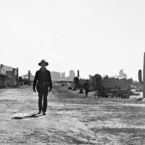 MY DARLING CLEMENTINE. Henry Fonda as Wyatt Earp, walking to the gunfight at the O. K. Corral, 1946