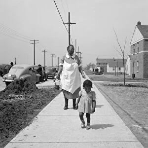 DETROIT, 1942. A woman and child, tenants of the newly built Sojourner Truth homes