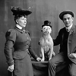 DOG TRAINERS, c1900. Mr. and Mrs. Frank Kern with their trained dog Bobbie. Photograph