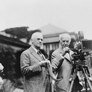 EASTMAN AND EDISON, 1928. American inventors George Eastman and Thomas Edison operating