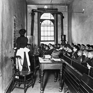 ELEMENTARY SCHOOL, c1894. A class in the condemned Essex Market School on the Lower