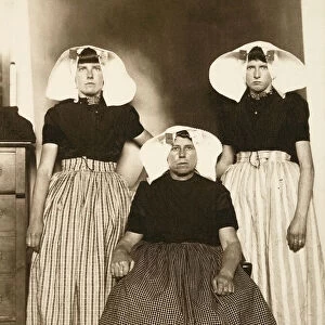 ELLIS ISLAND: FAMILY, c1910. Portrait of a mother with her two daughters from the Netherlands