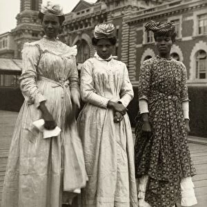 ELLIS ISLAND: WOMEN, 1911. Portrait of three woman from Guadeloupe at Ellis Island