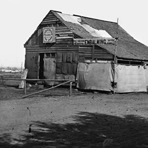 Embalming shed of Dr. William J. Bunnell in a converted barn near Fredericksburg, Virginia, used for the embalming of Union soldiers during the American Civil War. Photographed c1863