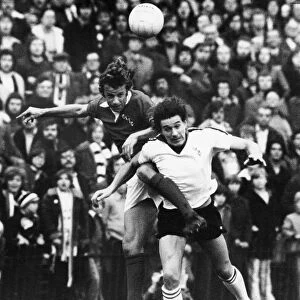 ENGLAND: SOCCER MATCH. Jim Giles (left) of Charleston FC and Ian Porterfield of Sunderland FC jump for the ball during a soccer match, 15 November 1975