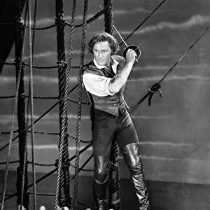 ERROL FLYNN (1909-1959). Australian actor. Flynn in the title role of The Sea Hawk, a 1940 film based on Rafael Sabatinis novel
