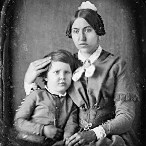 FAMILY, 19th CENTURY. A portrait of woman and a boy. Photograph of a daguerreotype