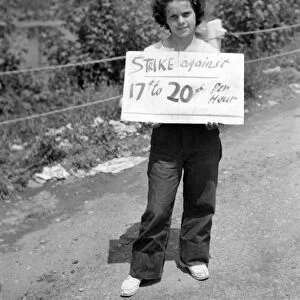 FARM STRIKE, 1938. A girl in the picket line at the King Farm strike in Morrisville, Pennsylvania