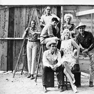 FILM: THE MISFITS, 1961. Clockwise from top: Arthur Miller, Eli Wallach, John Huston, Montgomery Clift, Marilyn Monroe and Clark Gable. Photographed on location while filming The Misfits, 1961