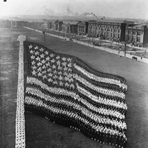 FLAG FORMATION, c1917. U. S. Navy sailors in the formation of an American flag. Photograph