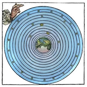 The fourth day. A pre-Copernican universe with the earth at the center. Woodcut from Hartmann Schedels Weltchronik, Nuremberg, Germany, 1493