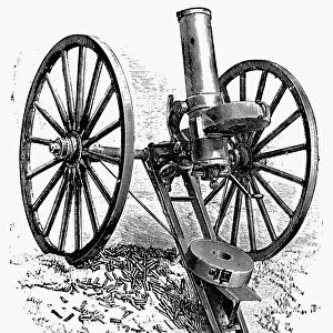 GATLING GUN, 19th CENTURY. An improved version of Richard Jordan Gatlings gun with drum-feed magazine. Line engraving, late 19th century