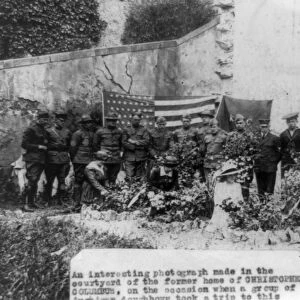 GENOA: HOME OF COLUMBUS. A group of American infantrymen posed in the courtyard