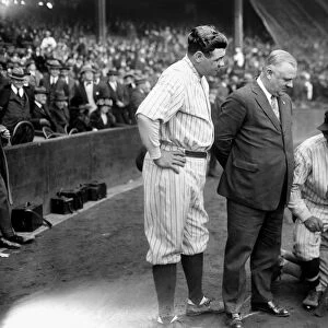 GEORGE H. RUTH (1895-1948). Known as Babe Ruth. American professional baseball player for the New York Yankees. Ruth (left) photographed with New York Giants manager John McGraw, with Nick Altrock and Al Schacht doing a comedy routine during the World Series, October 1923