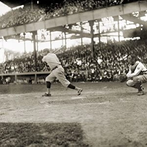 GEORGE H. RUTH (1895-1948). Known as Babe Ruth. Ruth swinging at a pitch during a game against the Washington Senators, c1921