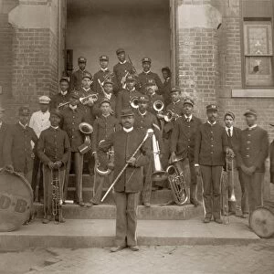 GEORGIA: BAND, c1900. African American members in a band, posed in front of a building in Georgia