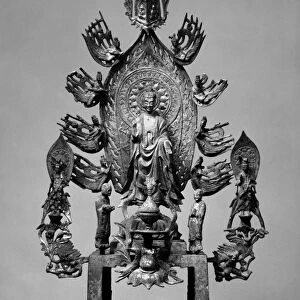 Gilt bronze altarpiece of Buddha Maitreya surrounded by attendants and celestial beings. Hebei province, China. Northern Wei, c525 A. D