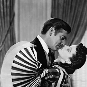 GONE WITH THE WIND, 1939. Vivien Leigh and Clark Gable in a scene from the film, Gone With The Wind, 1939