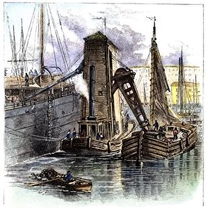 GRAIN ELEVATOR, 1877. A floating grain elevator in New York harbor sucks up grain from a barge and pours it through a chute into the hull of an adjoining ship, where it is bagged: wood engraving, American, 1877