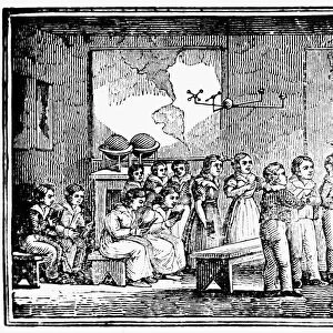 GRAMMAR SCHOOL, 1790s. A schoolmaster instructing a class at a school in New England, 1790s. Wood engraving