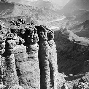 GRAND CANYON, c1913. A man and his donkey on Tanner Ledge, overlooking the Grand