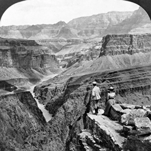 GRAND CANYON: SIGHTSEERS. A man and a woman looking out across the Granite Gorge