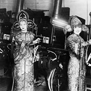 GRAUMANs THEATRE, 1927. Three female ushers in costume in the projection room