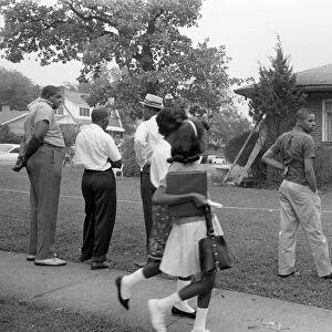 Group of African Americans viewing the bomb-damaged home of Arthur Shores, NaCP attorney, Birmingham, Alabama. Photographed by Marion Trikosko, 5 September 1963