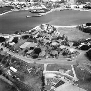GUANTANAMO BAY NAVAL BASE. Housing at Corinaso Point, with an amphitheater, tennis and basketball courts, and a baseball diamond, at the U. S. Naval Air Station at Guantanamo Bay, Cuba. Photograph, April 1960