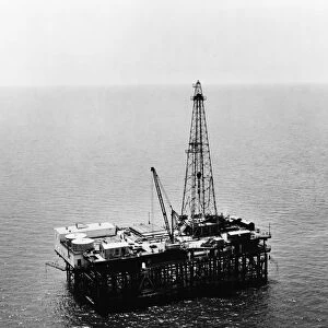 GULF OF MEXICO: OIL RIG, 1950. An offshore oil drilling platform in the Gulf of Mexico