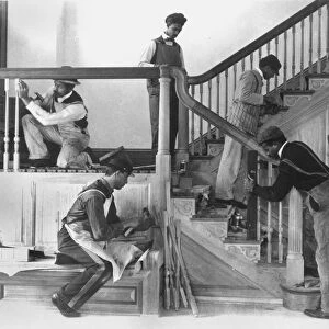 HAMPTON INSTITUTE, 1899. Students at work on the stairway in the residence of the treasurer