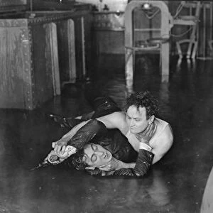 HARRY HOUDINI (1874-1926). American magician. Houdini overpowers Eugene Pallette in Terror Island, 1920